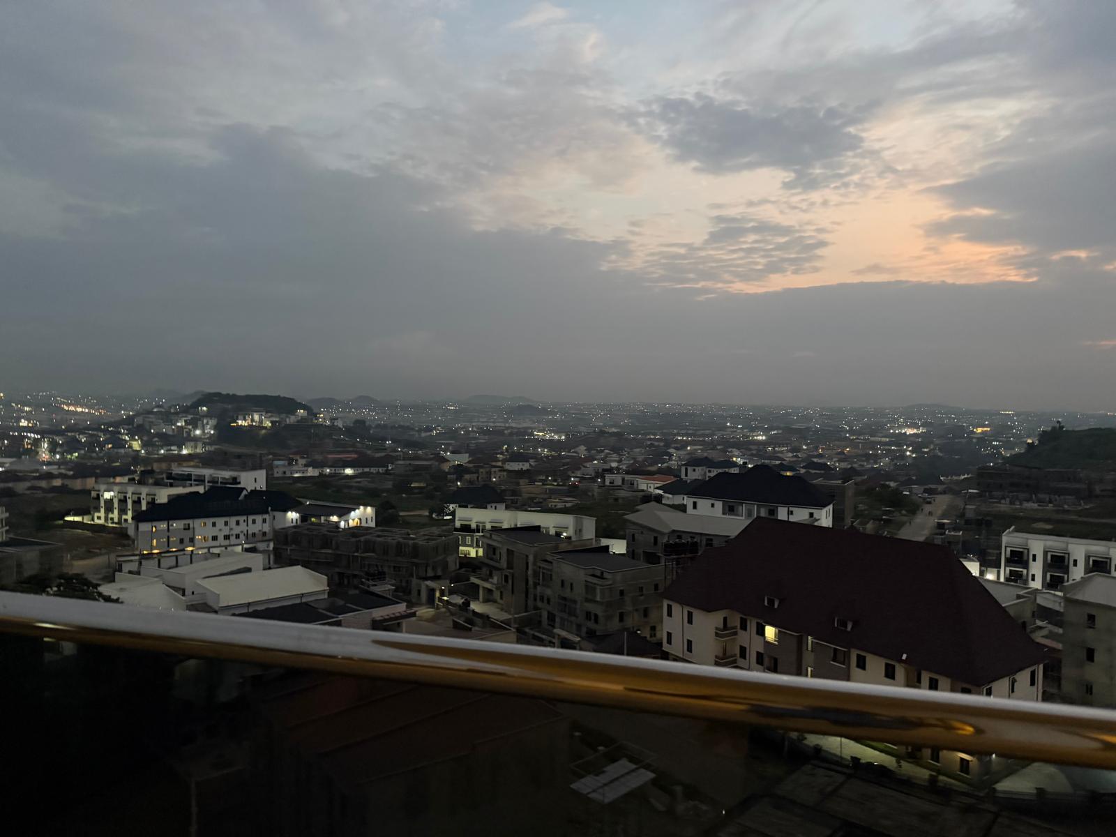 Wrap-around balcony corner overlooking Abuja